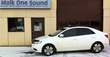 2013 Kia Forte with professional window tint in North Bay